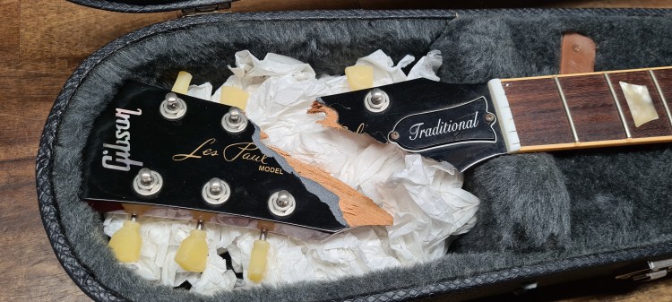 Headstock Repair Before