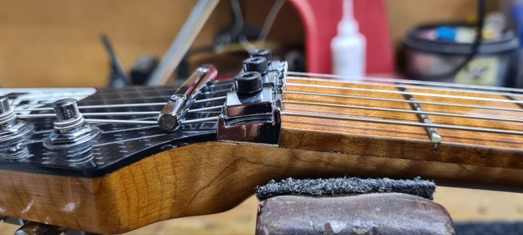 Restring Your Floyd Rose - Gently Install your Lock Nut CLamps