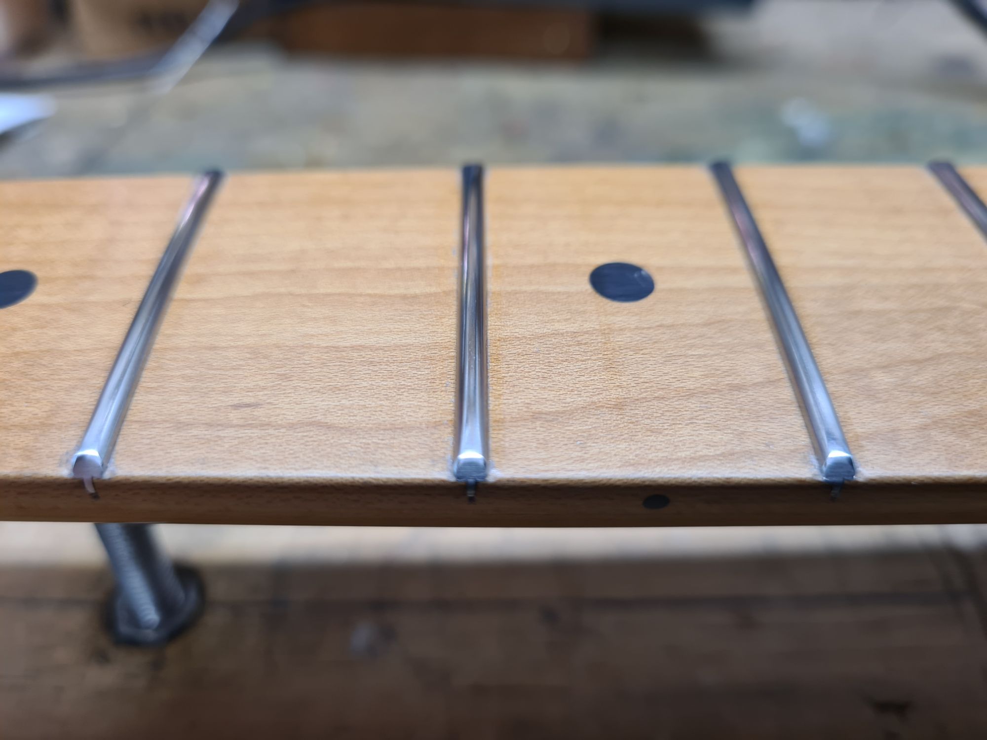 Stainless Frets Installed, Careful Deburring and Smoothing Over Ends.